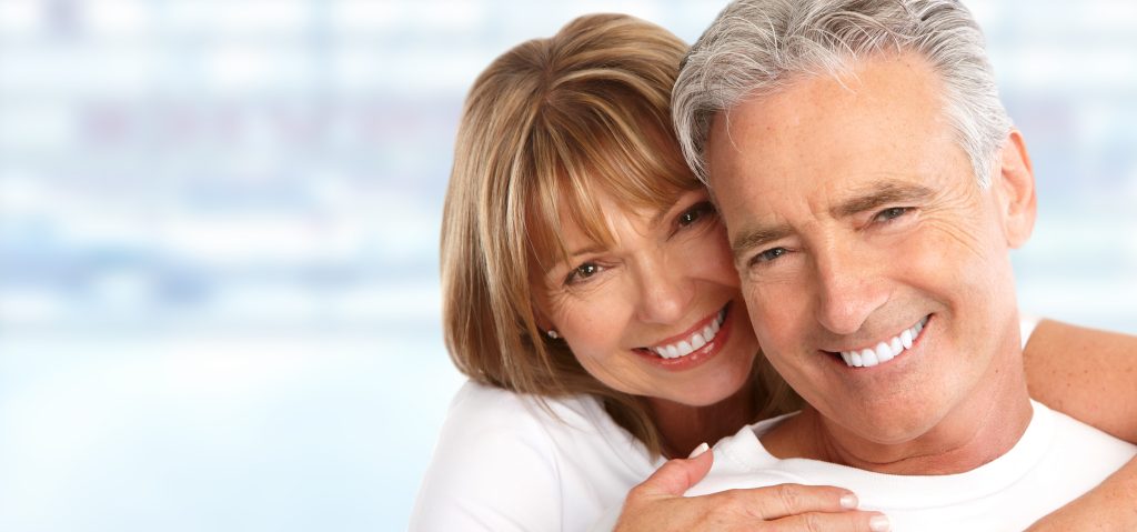 Happy Loving couple close up. Healthy white smile.